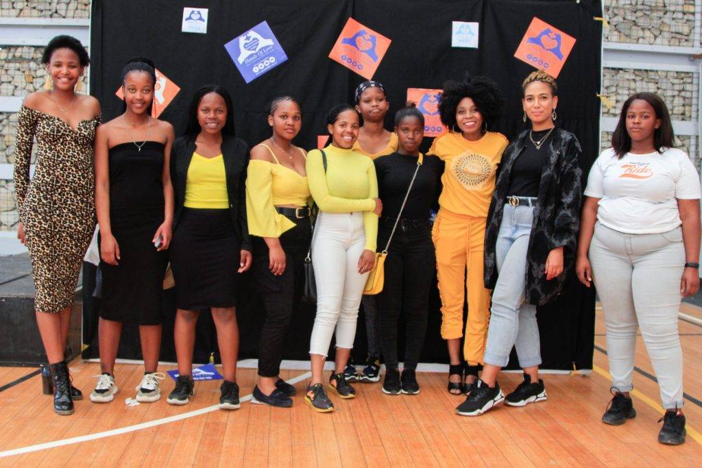 Hands of Love photo of speakers and audience